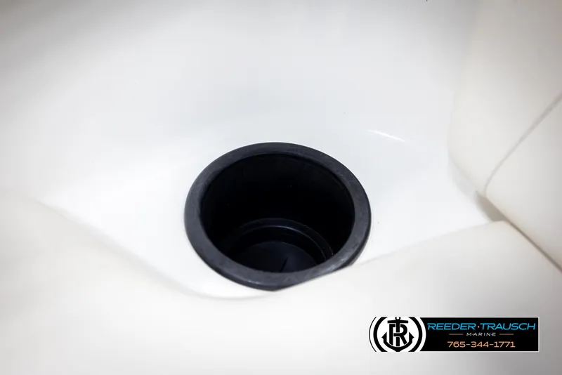 Slide: The Image of Cup holder on a 2013 Yamaha Boats 210 SX, white interior. - 40