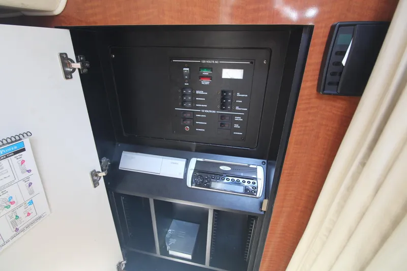 Slide: The Image of Electrical control panel inside 2004 Sea Ray 280 Sundancer boat cabin. - 20