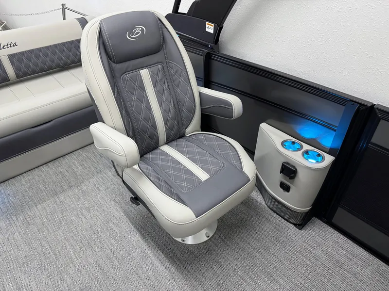Slide: The Image of Luxurious seating in 2025 Barletta Lusso 25UC boat with illuminated cup holders. - 15