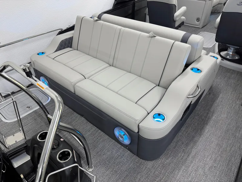 Slide: The Image of Luxurious seating on 2025 Barletta Lusso 25UC pontoon boat with cup holders and sleek design. - 3