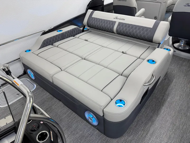 Slide: The Image of Luxurious seating on 2025 Barletta Lusso 25UC boat with cup holders and modern design. - 4