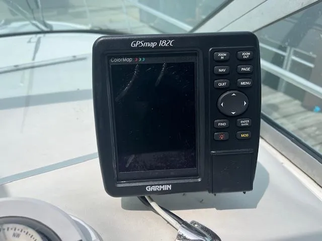 Slide: The Image of Garmin GPSmap 182C on 1998 Sea Ray 290 Sundancer boat dashboard. - 7