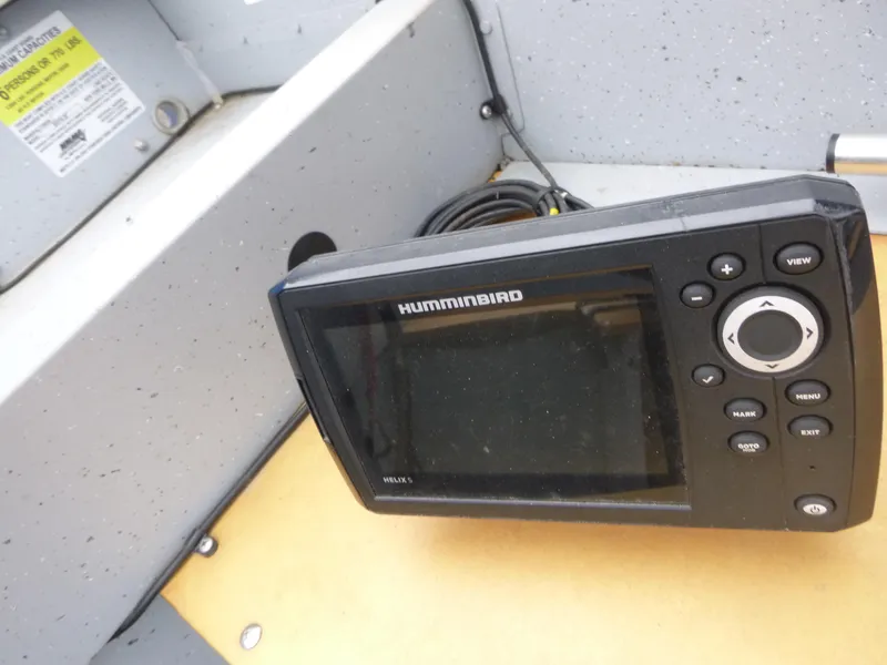 Slide: The Image of Humminbird Helix 5 fish finder on 2022 Lund SSV-16 boat interior. - 7