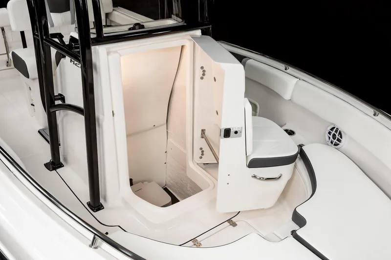 Slide: The Image of Manufacturer Provided Image: 2025 Robalo R222 Center Console boat interior with open storage compartment. - 35