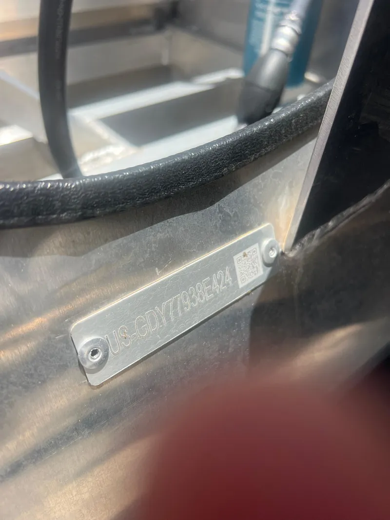 Slide: The Image of 2022 Godfrey Monaco 235 SDB identification plate with serial number and QR code. - 12