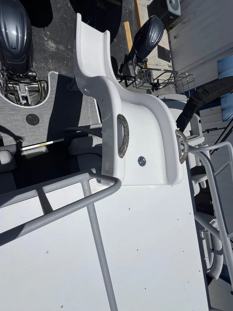 Slide: The Image of 2022 Godfrey Monaco 235 SDB boat with slide and dual engines, top view. - 34