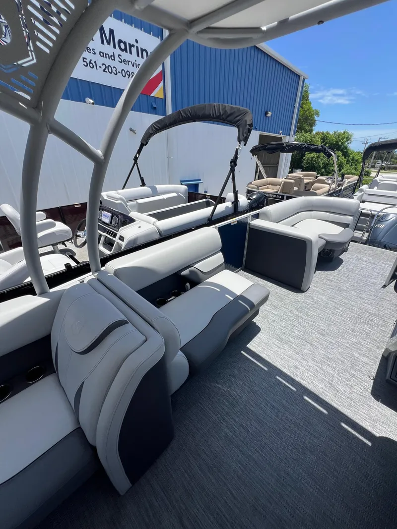 Slide: The Image of 2022 Godfrey Monaco 235 SDB pontoon boat with spacious seating and modern design. - 5