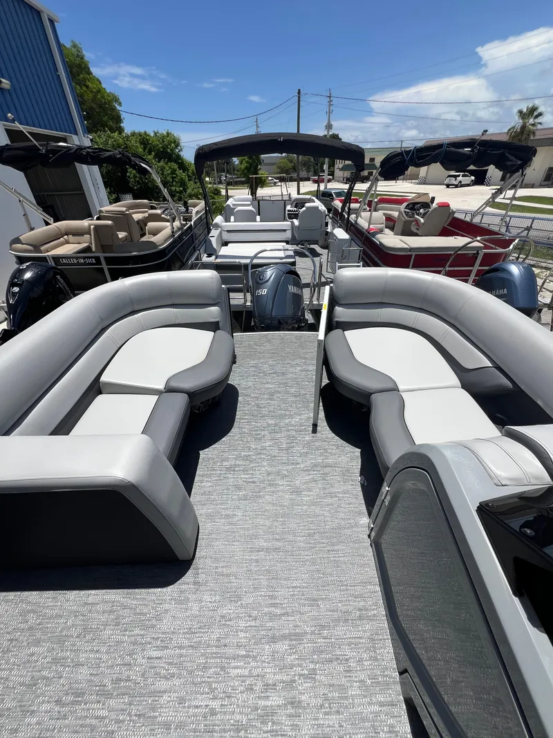 Slide: The Image of 2022 Godfrey Monaco 235 SDB pontoon boat with spacious seating and dual Yamaha engines. - 8