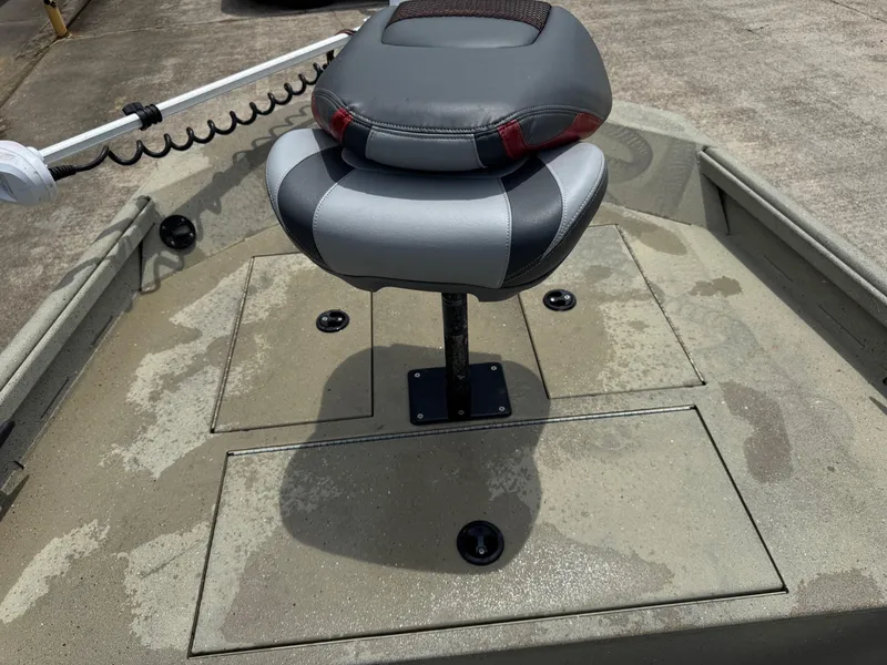 Slide: The Image of 2018 Alumacraft 1860 Bay boat seat and deck, featuring a trolling motor. - 7