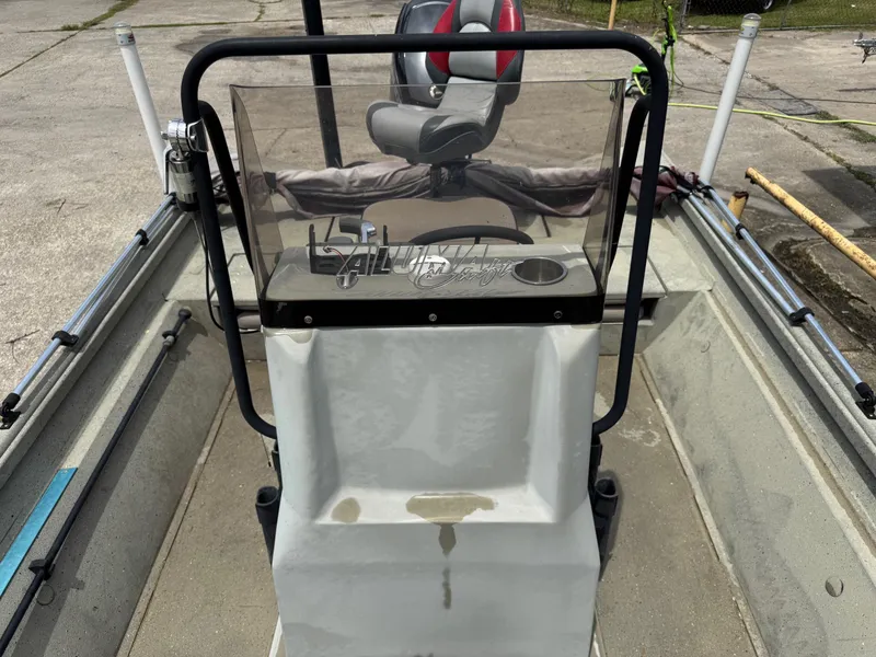 Slide: The Image of 2018 Alumacraft 1860 Bay boat console with steering wheel and seat. - 8