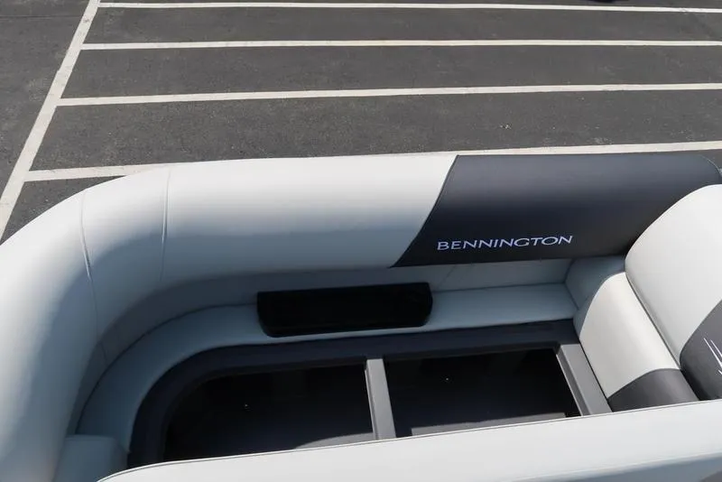 Slide: The Image of 2026 Bennington S Quad Bench 22 SSR boat interior with sleek seating design. - 19