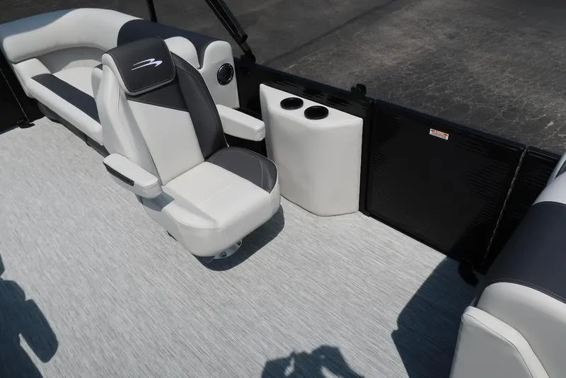 Slide: The Image of 2026 Bennington S Quad Bench 22 SSR interior with sleek seating and cup holders. - 20