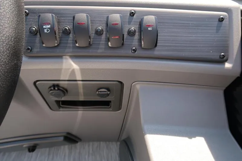 Slide: The Image of Control panel of 2026 Bennington S Quad Bench 22 SSR with switches and dials. - 28