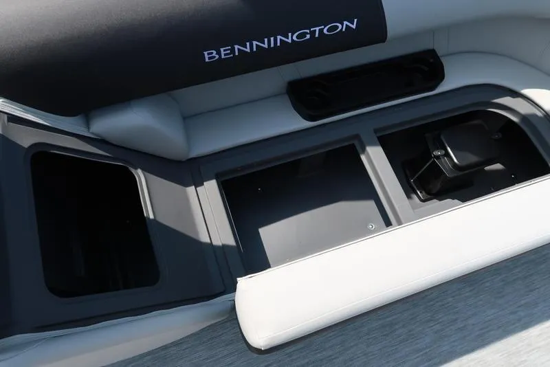Slide: The Image of 2026 Bennington S Quad Bench 22 SSR boat seat storage compartment. - 29