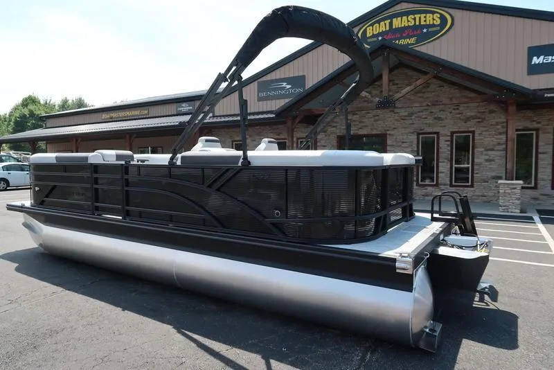 Slide: The Image of 2026 Bennington S Quad Bench 22 SSR pontoon boat at dealership. - 6