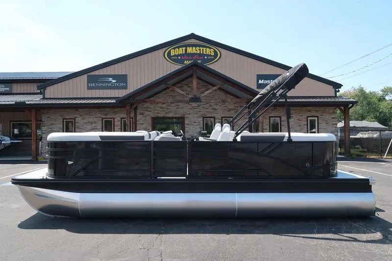 Slide: The Image of 2026 Bennington S Quad Bench 22 SSR pontoon boat at dealership. - 9