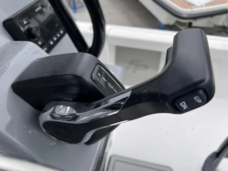 Slide: The Image of Throttle control of 2026 Sea Pro 230 DLX boat, featuring modern design and functionality. - 12