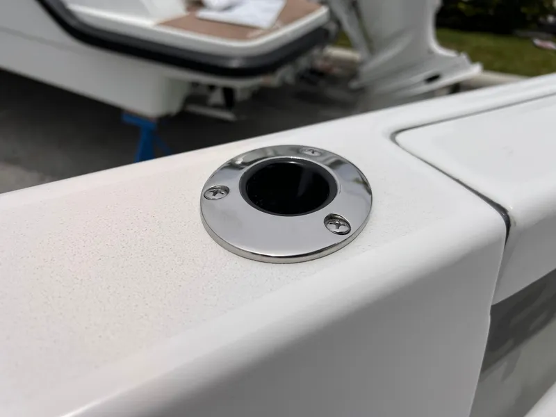 Slide: The Image of 2026 Sea Pro 230 DLX boat detail with stainless steel rod holder. - 38