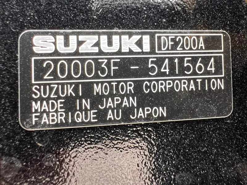 Slide: The Image of 2026 Sea Pro 230 DLX with Suzuki DF200A engine, serial number 20003F-541564, made in Japan. - 53