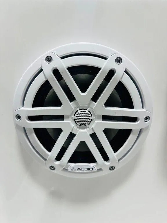 Slide: The Image of White JL Audio speaker on Sportsman MASTERS 247OE, 2025 model. - 14