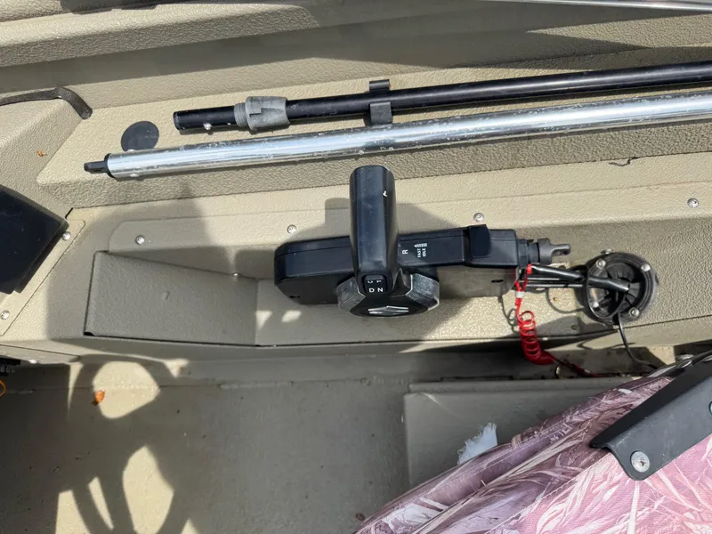 Slide: The Image of 2021 Alumacraft 2072 SC boat interior with control panel and steering mechanism. - 10