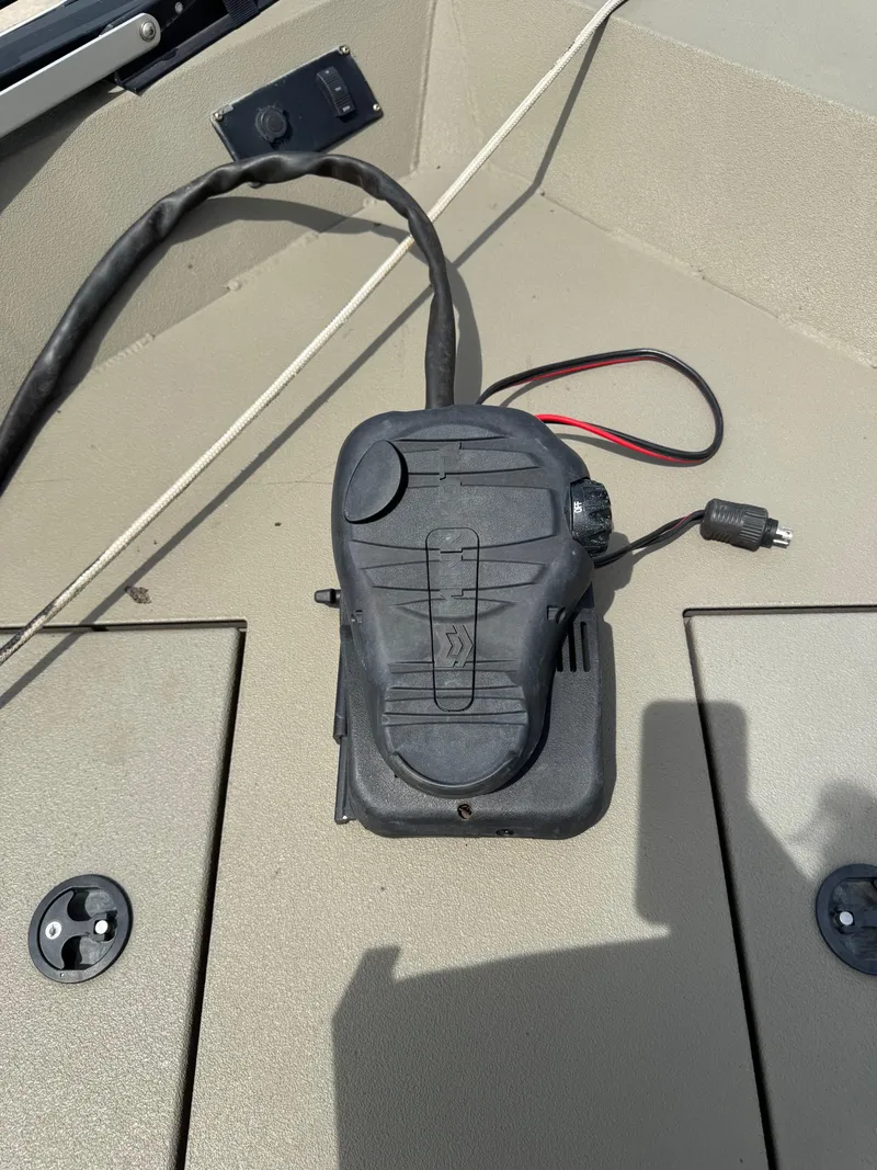 Slide: The Image of Foot pedal control on 2021 Alumacraft 2072 SC boat deck. - 6