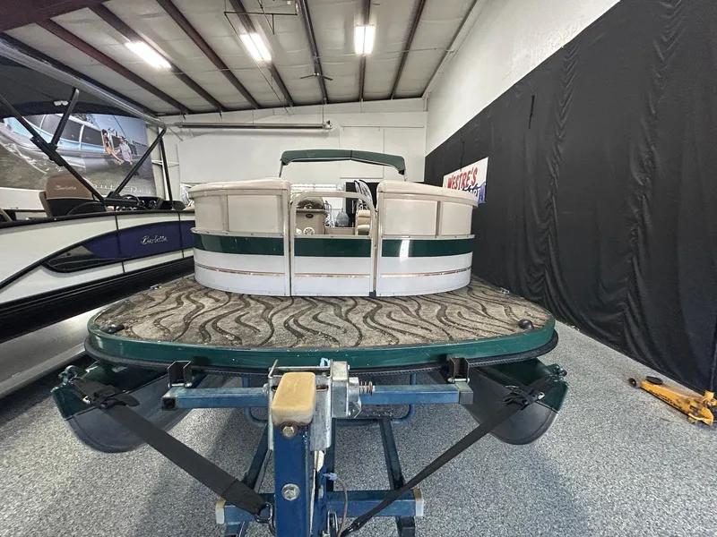 Slide: The Image of 2003 Crestliner LSi Angler 2485 pontoon boat on trailer in indoor showroom. - 4