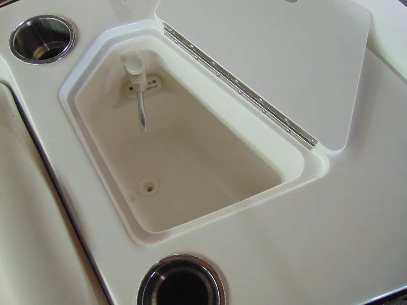 Slide: The Image of 2021 Hurricane SunDeck Sport 188 IO boat sink and cup holders. - 11