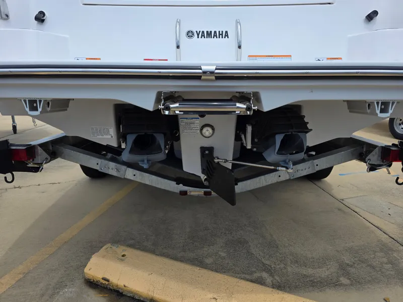 Slide: The Image of 2025 Yamaha Boats 222 FSH Sport E rear view, showcasing dual jet propulsion system. - 17