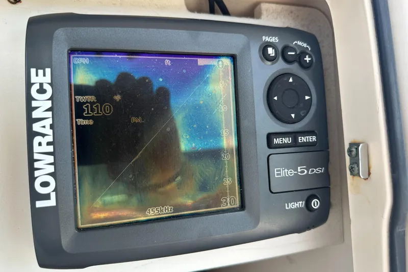 Slide: The Image of Lowrance Elite-5 DSI fishfinder on 2005 Grady-White Escape 209 boat dashboard. - 26