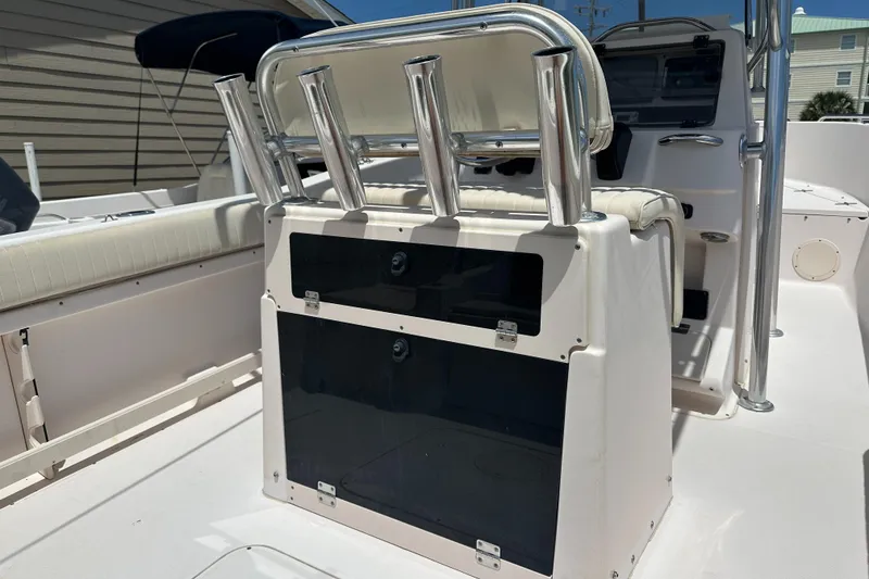 Slide: The Image of 2005 Grady-White Escape 209 boat interior with rod holders and seating. - 36