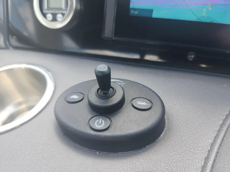 Slide: The Image of Control panel of 2020 Formula 310 Sun Sport boat with joystick and buttons. - 19