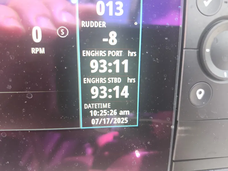 Slide: The Image of Dashboard display of a 2020 Formula 310 Sun Sport showing engine hours and date. - 20