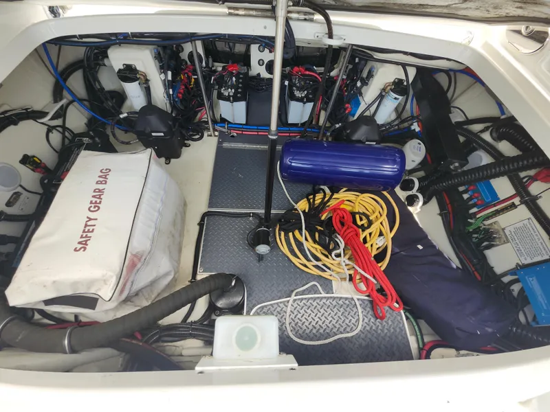 Slide: The Image of Engine compartment of a 2020 Formula 310 Sun Sport with safety gear and equipment. - 36