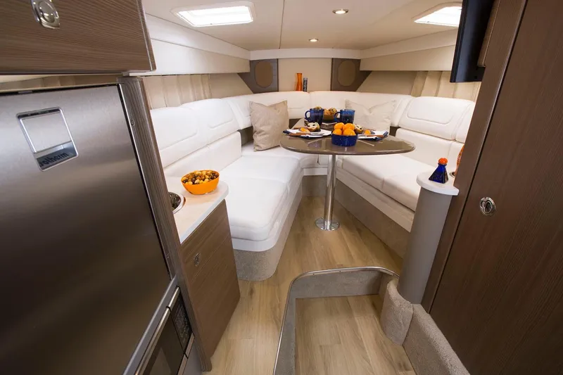 Slide: The Image of Manufacturer Provided Image: Interior of 2020 Formula 310 Sun Sport boat with modern seating and dining area. - 38