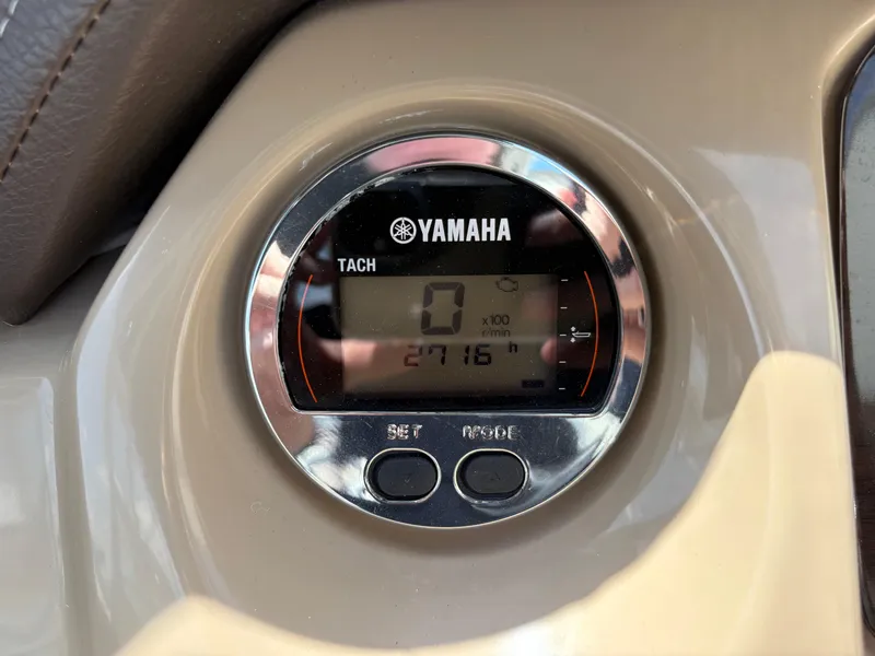 Slide: The Image of Yamaha tachometer on 2016 Chaparral 230 Suncoast boat dashboard, displaying 2716 hours. - 39