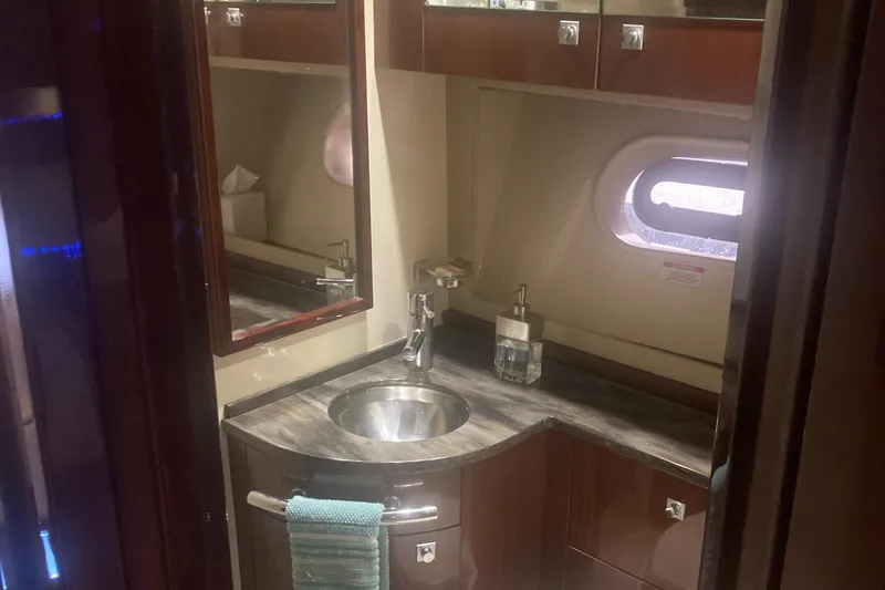 Slide: The Image of Luxurious bathroom interior of 2015 Sea Ray 450 Sundancer yacht with modern fixtures. - 13