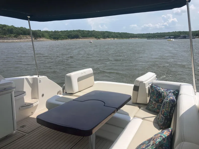 Slide: The Image of Luxury 2015 Sea Ray 450 Sundancer yacht interior with scenic lake view. - 6