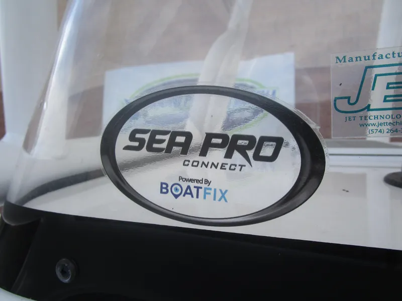 Slide: The Image of Sticker on 2025 Sea Pro 230 DLX BAY boat, featuring Sea Pro Connect powered by BoatFix. - 6