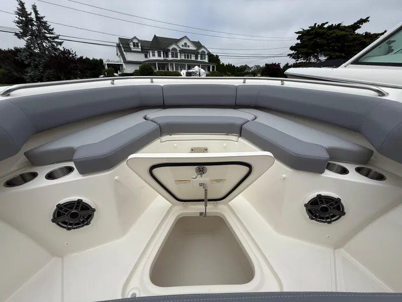 Slide: The Image of 2026 Boston Whaler 250 Outrage boat interior with seating and storage compartment. - 33