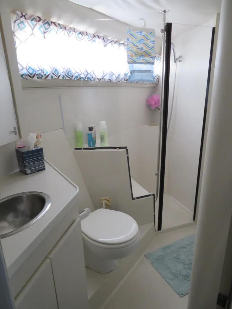 Slide: The Image of Bathroom interior of 1994 Carver 380 Santego yacht with shower and sink. - 8