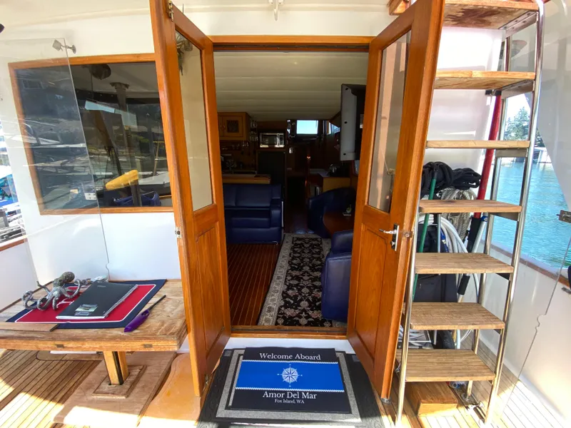 Slide: The Image of Interior view of 1982 C & L Sea Ranger yacht with wooden doors and nautical decor. - 30