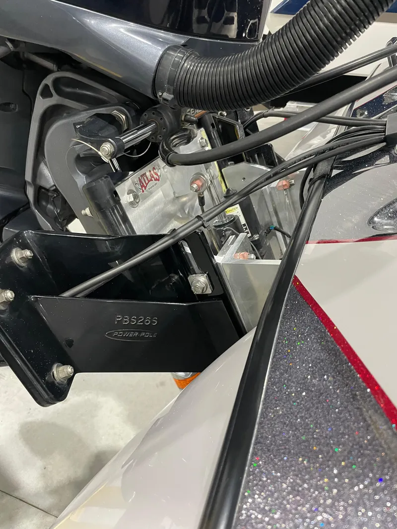 Slide: The Image of Close-up of 2020 Skeeter FXR 21 Limited boat components, featuring Power-Pole bracket and wiring. - 8