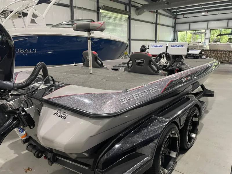 Slide: The Image of 2020 Skeeter FXR 21 Limited boat in showroom, featuring sleek design and advanced equipment. - 9