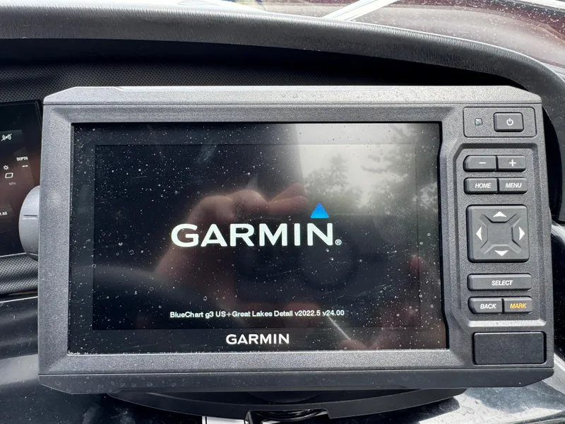Slide: The Image of Garmin navigation system on 2023 Yamaha Boats AR190 dashboard. - 15