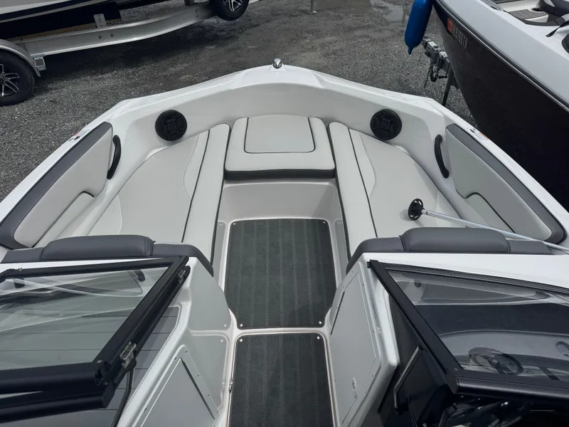 Slide: The Image of 2023 Yamaha AR190 boat interior with sleek seating and modern design. - 4