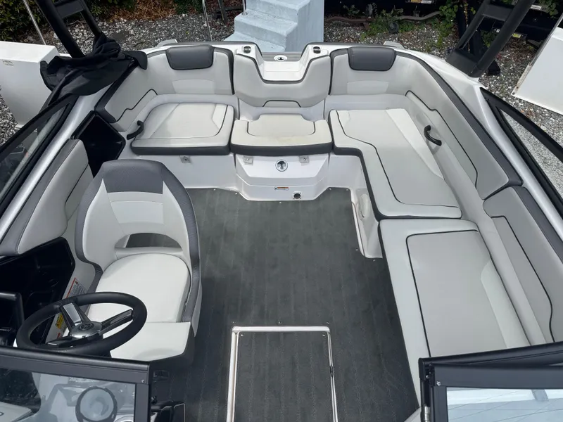 Slide: The Image of 2023 Yamaha AR190 boat interior with spacious seating and modern design. - 7