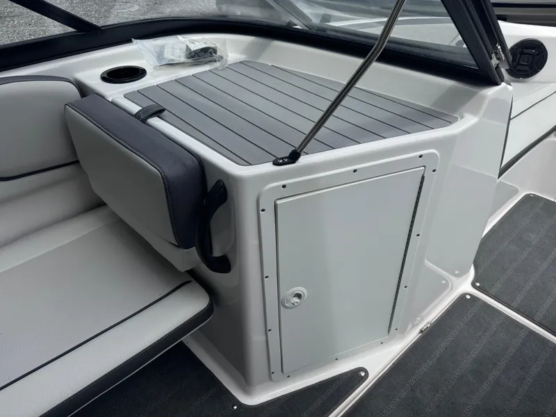 Slide: The Image of 2023 Yamaha AR190 boat interior with seating and storage compartment. - 8