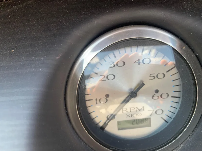 Slide: The Image of Close-up of a 2021 Bennington 24 LSR RPM gauge showing 2000 RPM. - 15