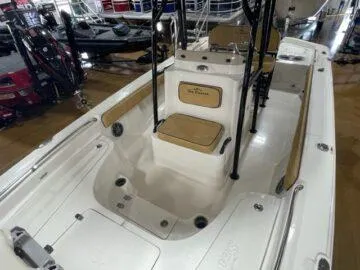 Slide: The Image of 2024 Sea Chaser LX boat interior with seating and storage compartments. - 5